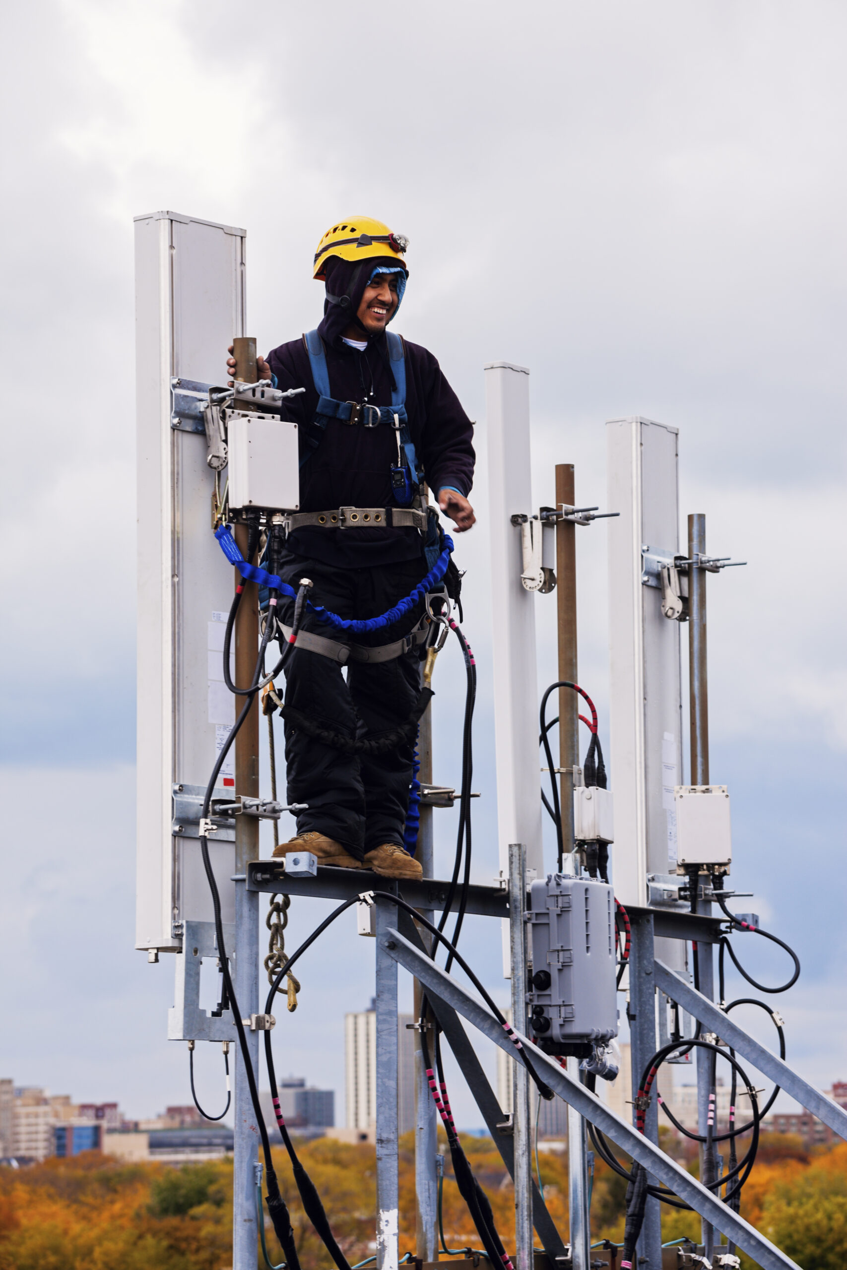 Tower crew leader working on the heights with the cellular antennas.